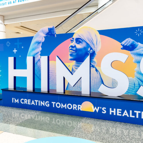 Healthcare leaders discussing digital transformation at HIMSS25 conference